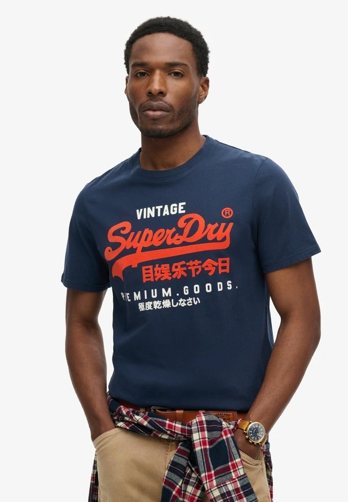Kaos Grafis Vintage Logo Herit - Women Fashion Brand Logo ulasan dan harga